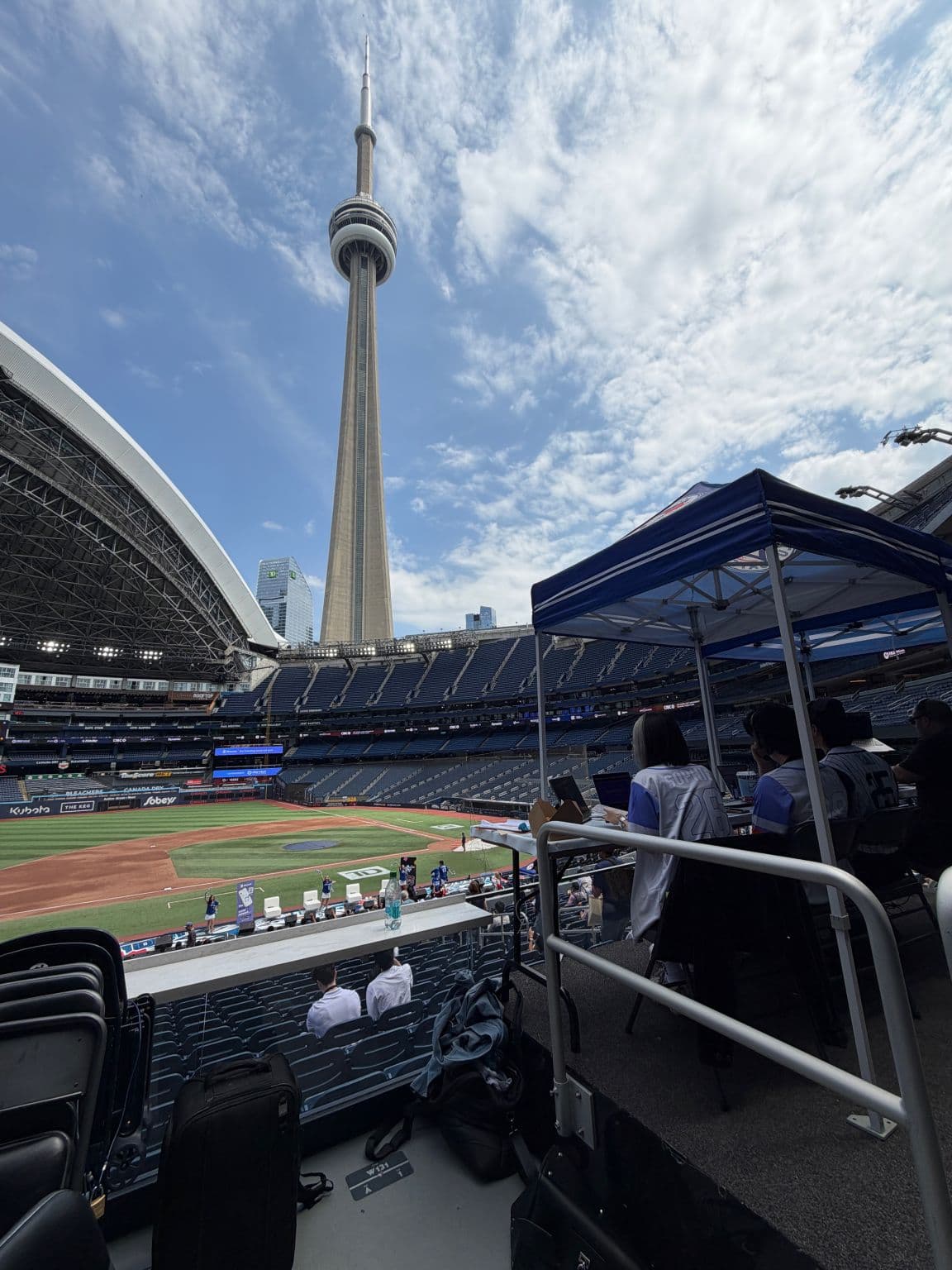 The CN Tower above the Rogers Centre during BlossomCon 2026