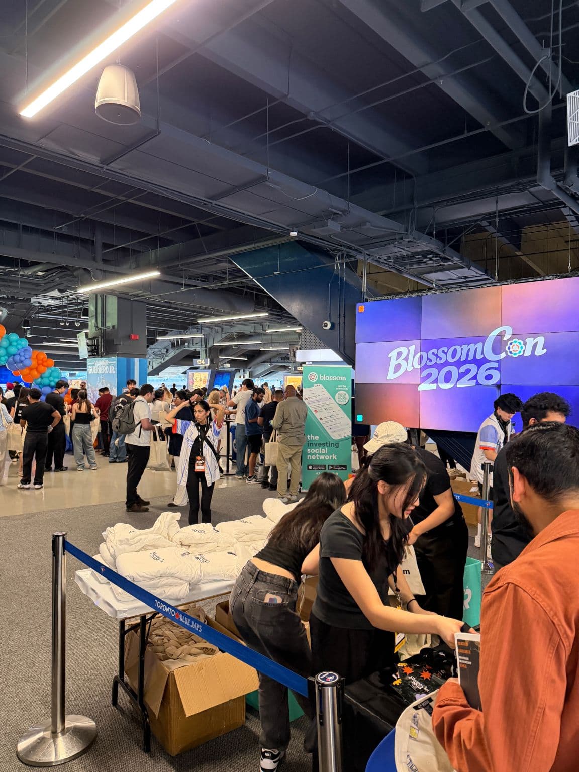 Attendees at the BlossomCon 2026 booths